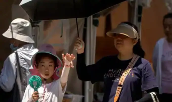 Child and his Mother under umbrella