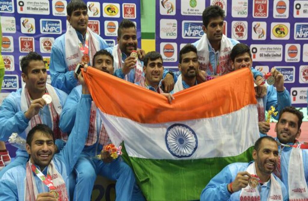 Kabbadi team holding India's flag