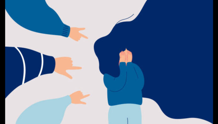 children-engage-in-bullying-behavior towards a school girl
