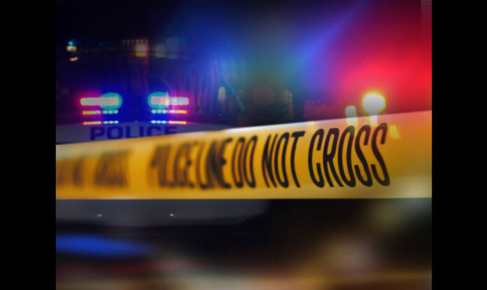 Crime scene and do not cross written on yellow tape