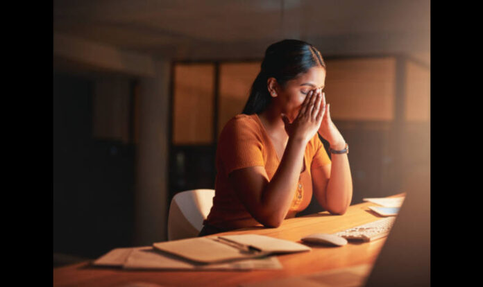 businesswoman-sitting-alone-in-the-office