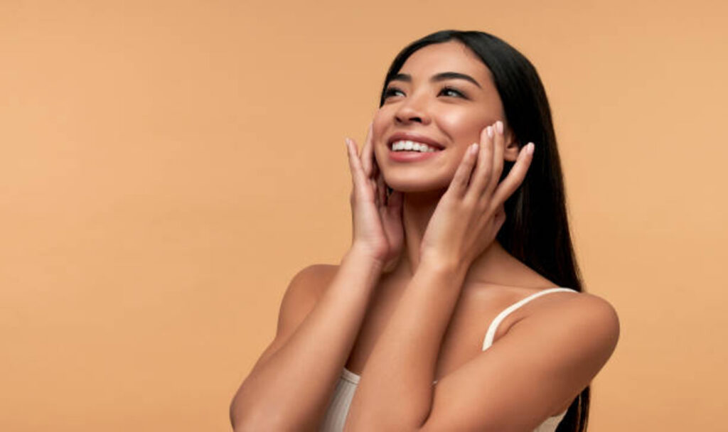 Woman touching her skin