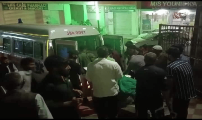 People gathered near ambulance