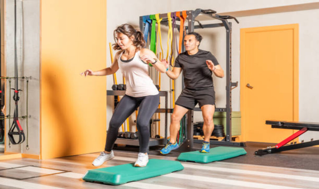 Woman and men doing lateral jump