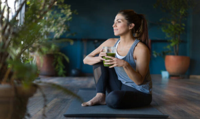 Woman drinking detox juice