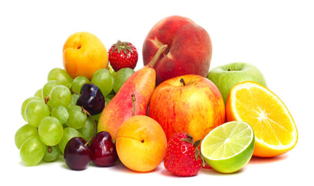 Fruits piled up on white background