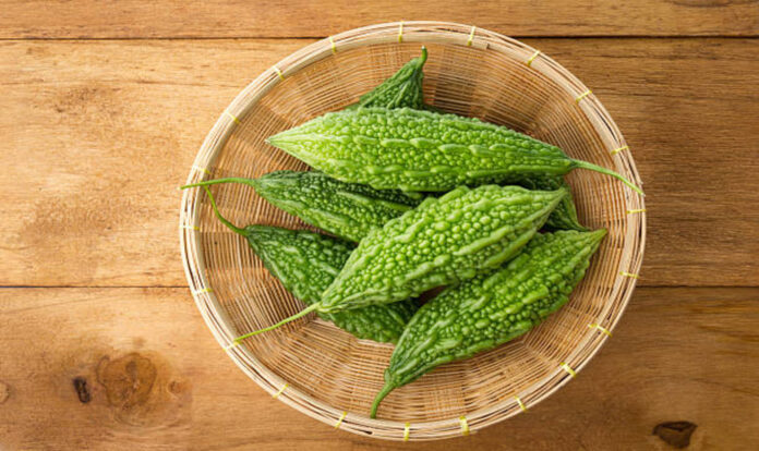 Green bitter gourd in basket