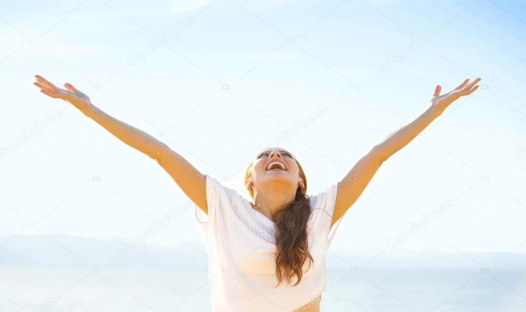 Happy woman spreading her arms