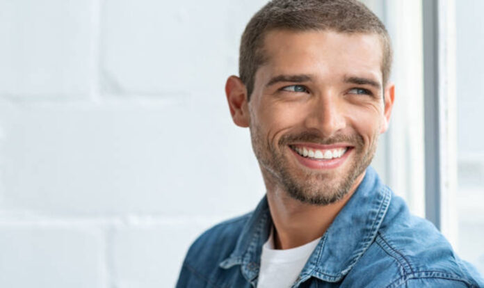 Happy man looking away