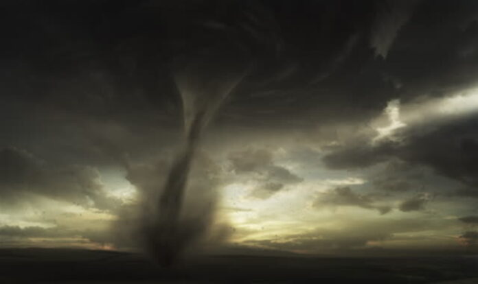 Tornado in dark sky