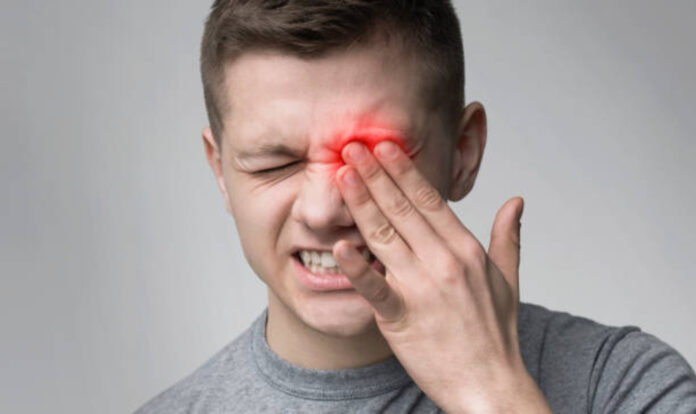 Men suffering from eye pain