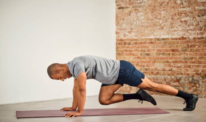 Men doing mountain-climbing-exercise