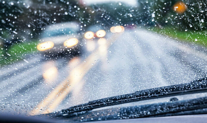 Raindrops on windshield and glass