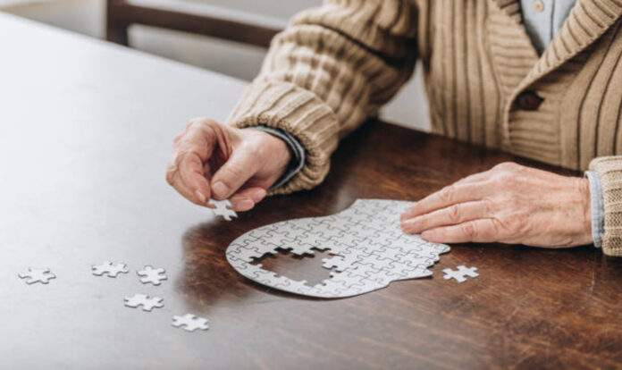 senior-man-playing-with-puzzle