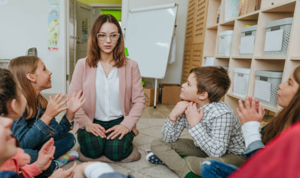 students-talking to teacher