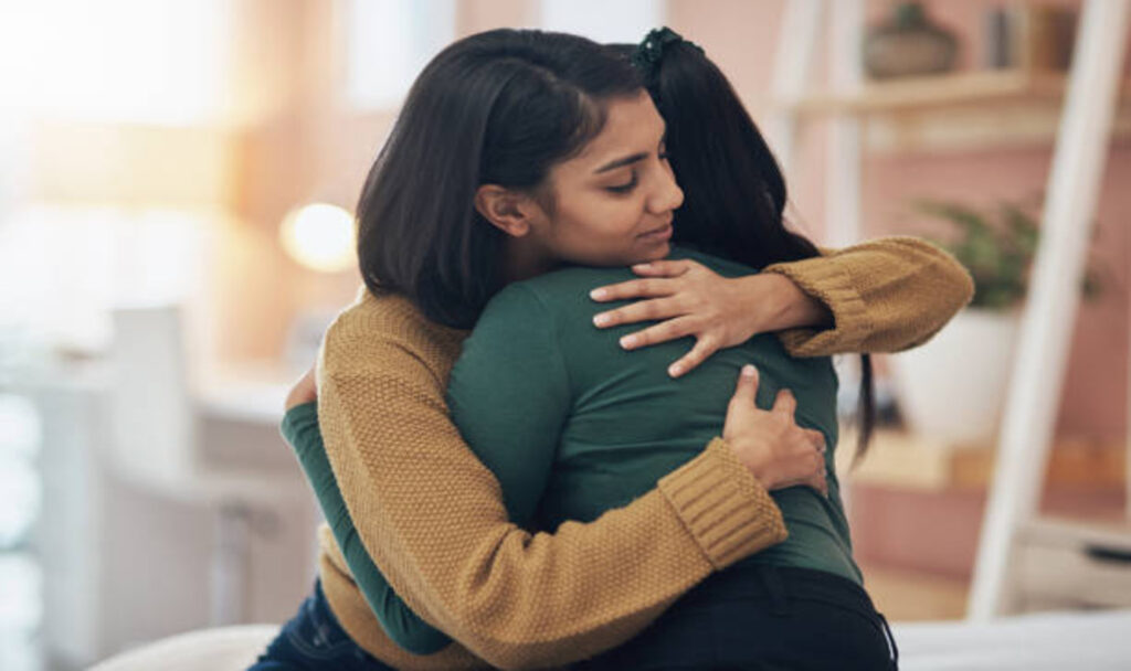 Woman supporting her friend
