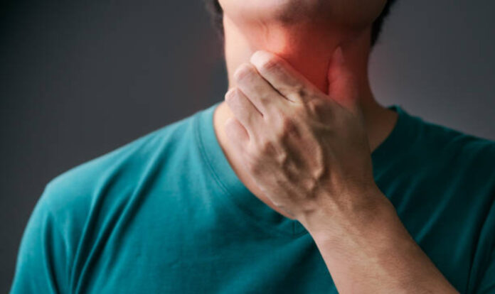 Men having throat pain