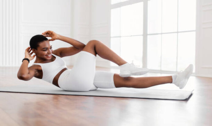 Woman doing twist crunches
