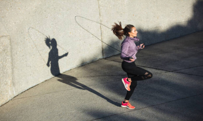 Woman skipping ropes