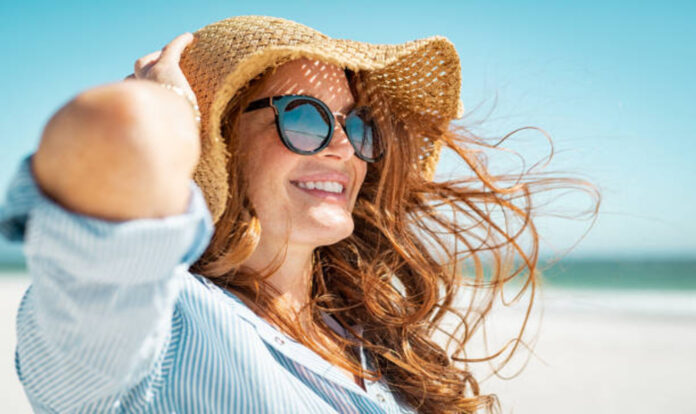 Woman enjoying on beach