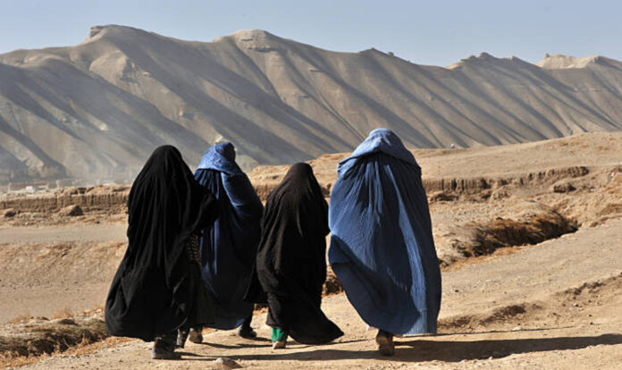 Woman walking in desert