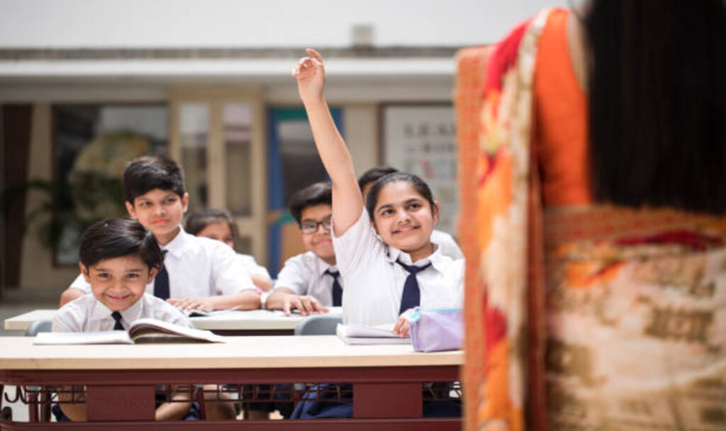 girl-raising-hand-in-classroom