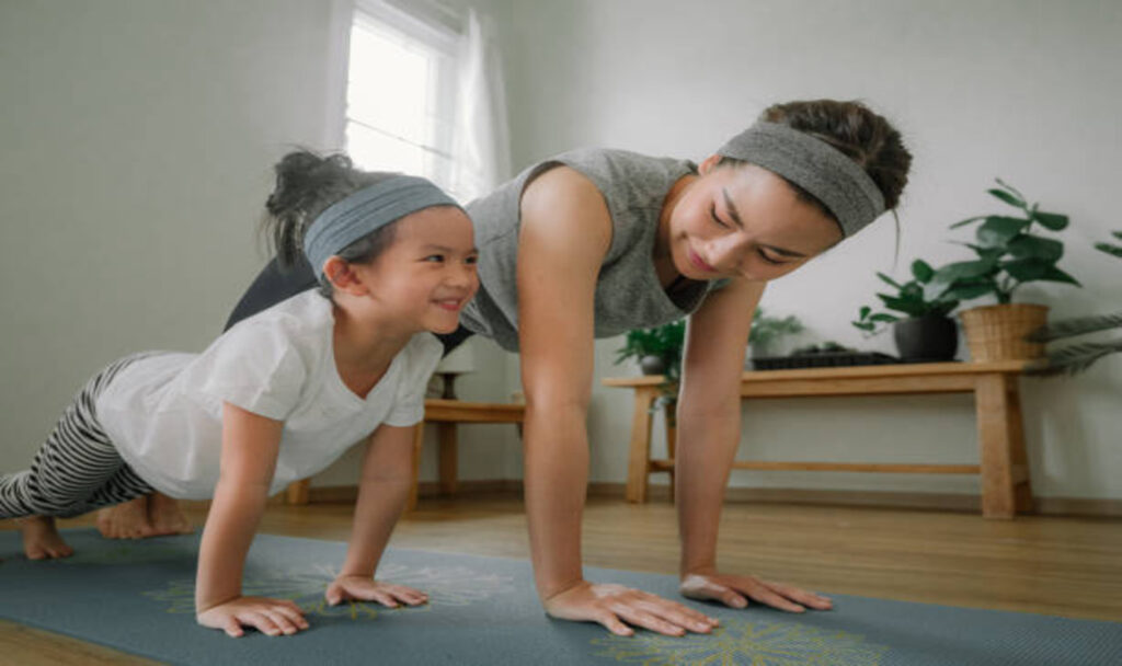 Mother and daughter exercising